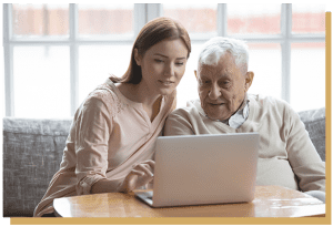 senior man looking at laptop with woman life settlements settlement viatical senior couple seniors